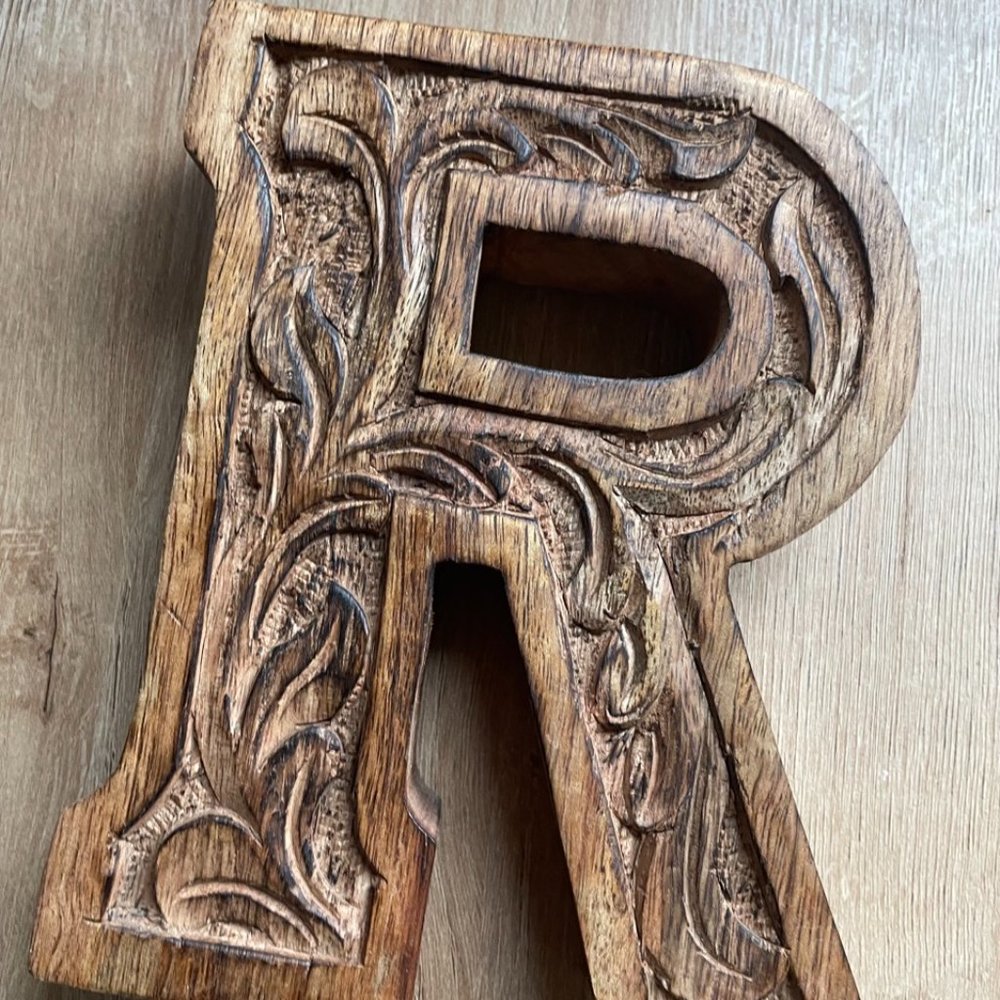 Carved wood letter